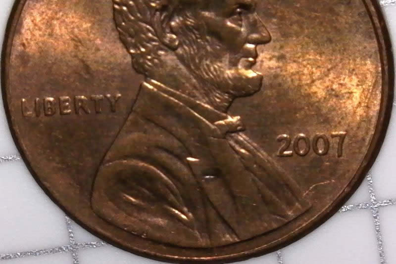 2007-P-Lincoln-Cent-Struck-Through-Wire-Brush-Bristle-Maybe-Or-Thread?